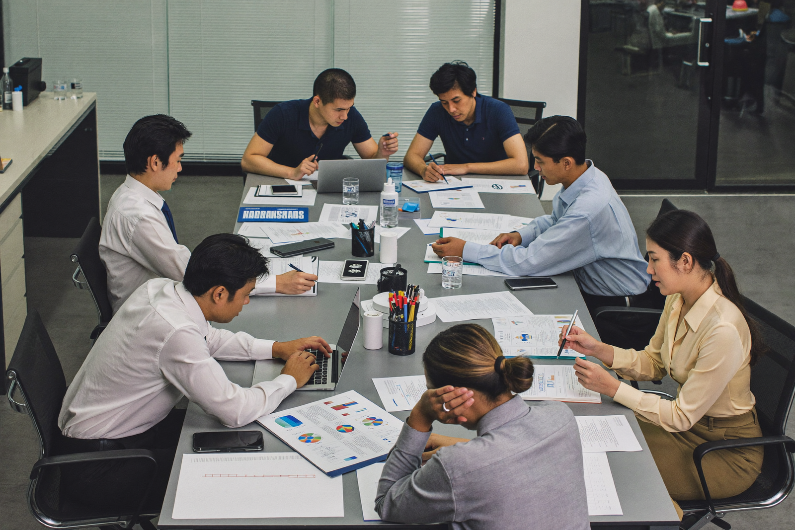 Cross-functional team validating KBLI choices against the operating model